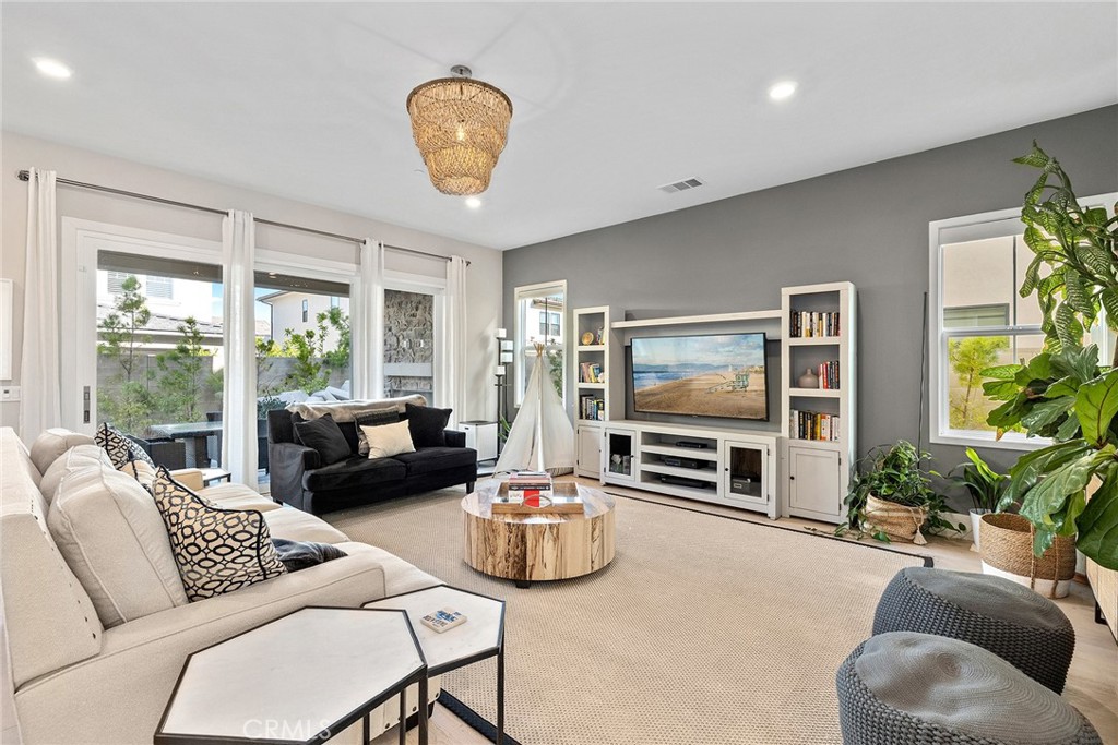 70 Ray Irvine, CA 92618 - Photo 4 of 41 a living room with furniture and a flat screen tv