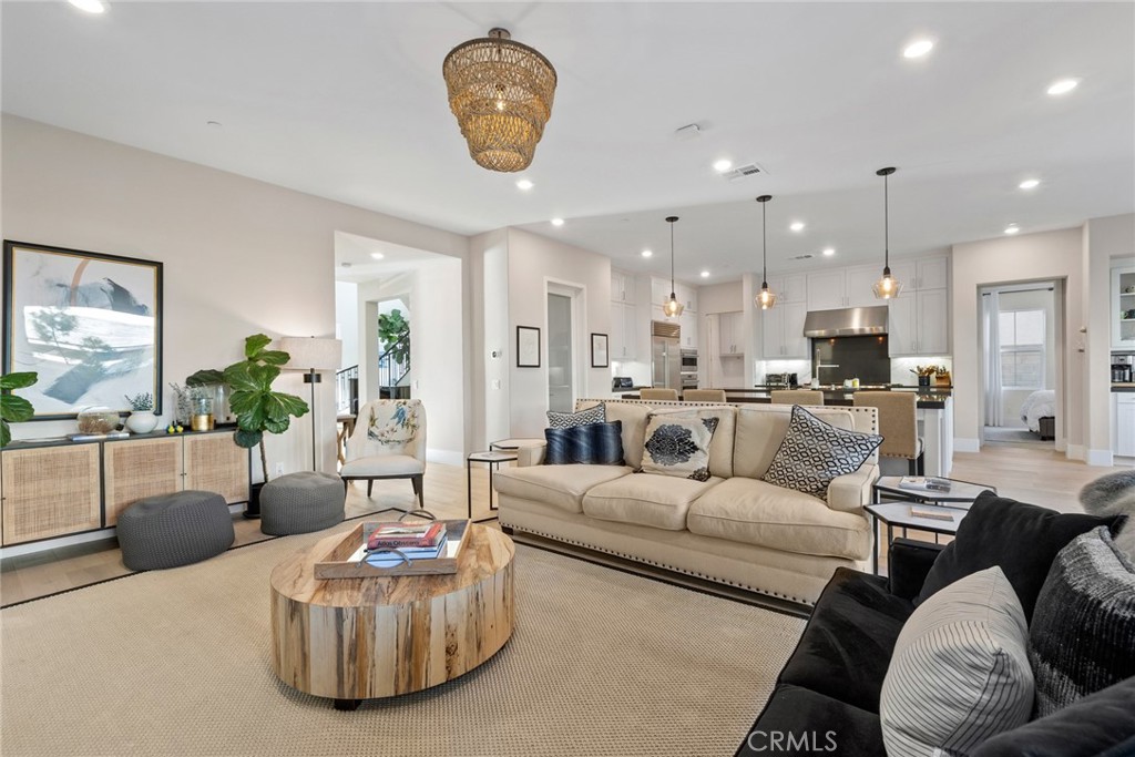 70 Ray Irvine, CA 92618 - Photo 6 of 41 a living room with furniture and kitchen view