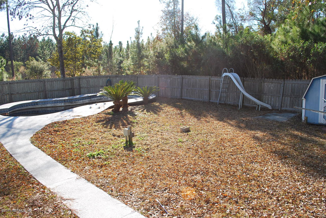 1530 Chaffee Road South Jacksonville, FL 32221 - Photo 18 of 24 Pool and fenced yard