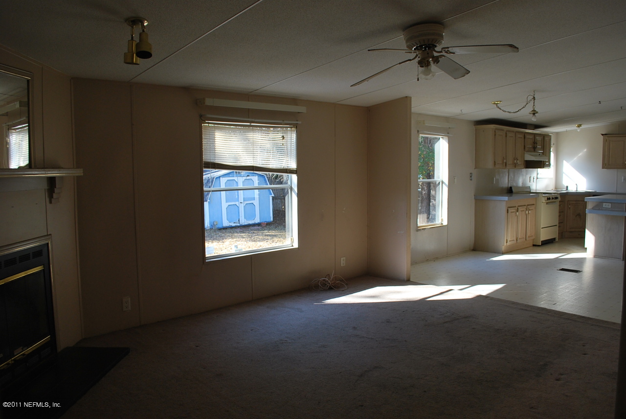 1530 Chaffee Road South Jacksonville, FL 32221 - Photo 6 of 24 Family room to kitchen