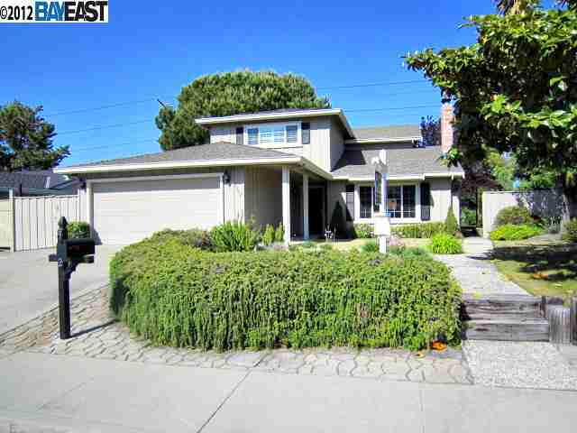 9962 Windsor Way San Ramon, CA 94583 - Photo 1 of 1 a front view of a house with garden