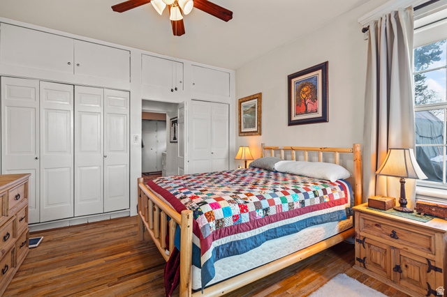 155 West Center Street Fillmore, UT 84631 - Photo 16 of 86 Bedroom with multiple closets, wood-type flooring, and a ceiling fan