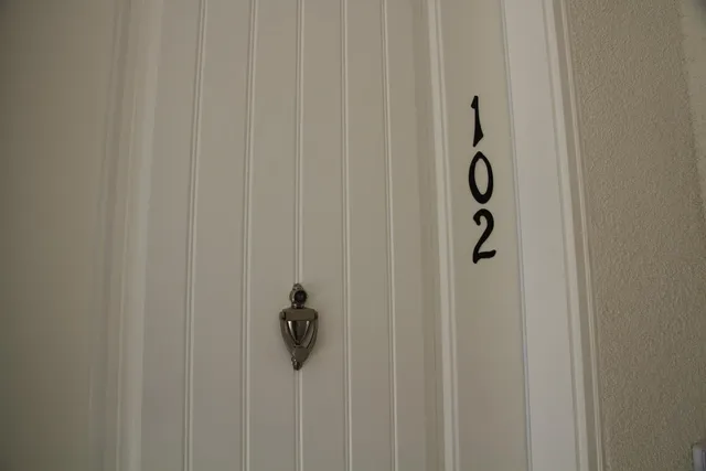 a stove top oven sitting inside of a kitchen