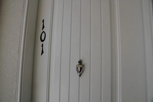 a stove top oven sitting inside of a kitchen