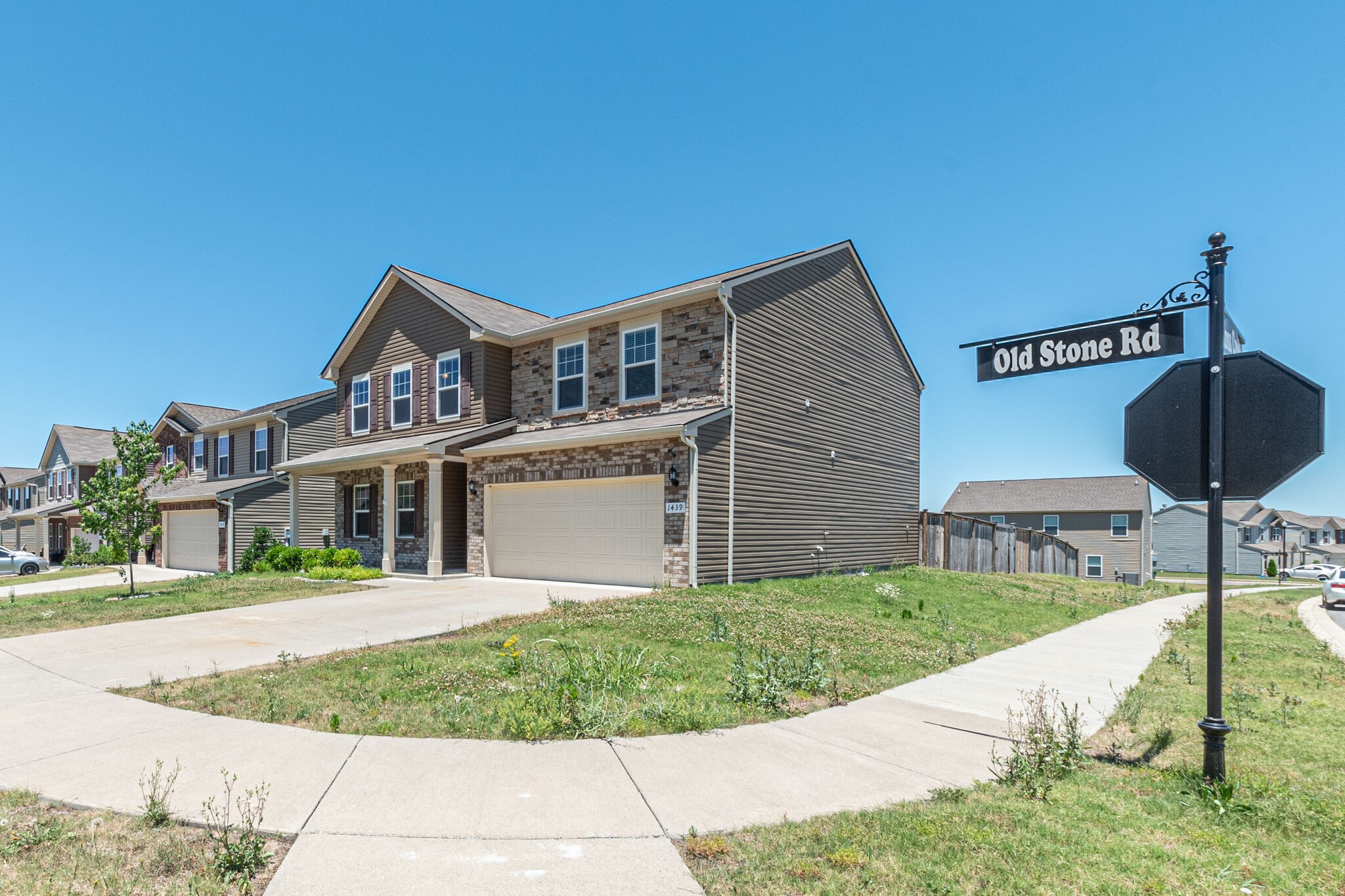 1439 Old Stone Road Lebanon, TN 37087 - Photo 2 of 39 a front view of a house with a yard
