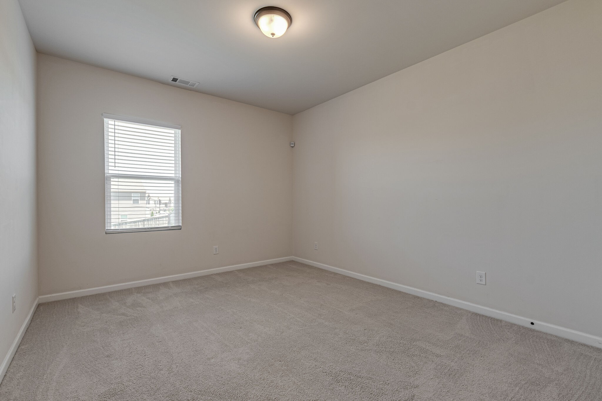 1439 Old Stone Road Lebanon, TN 37087 - Photo 19 of 39 an empty room with a window