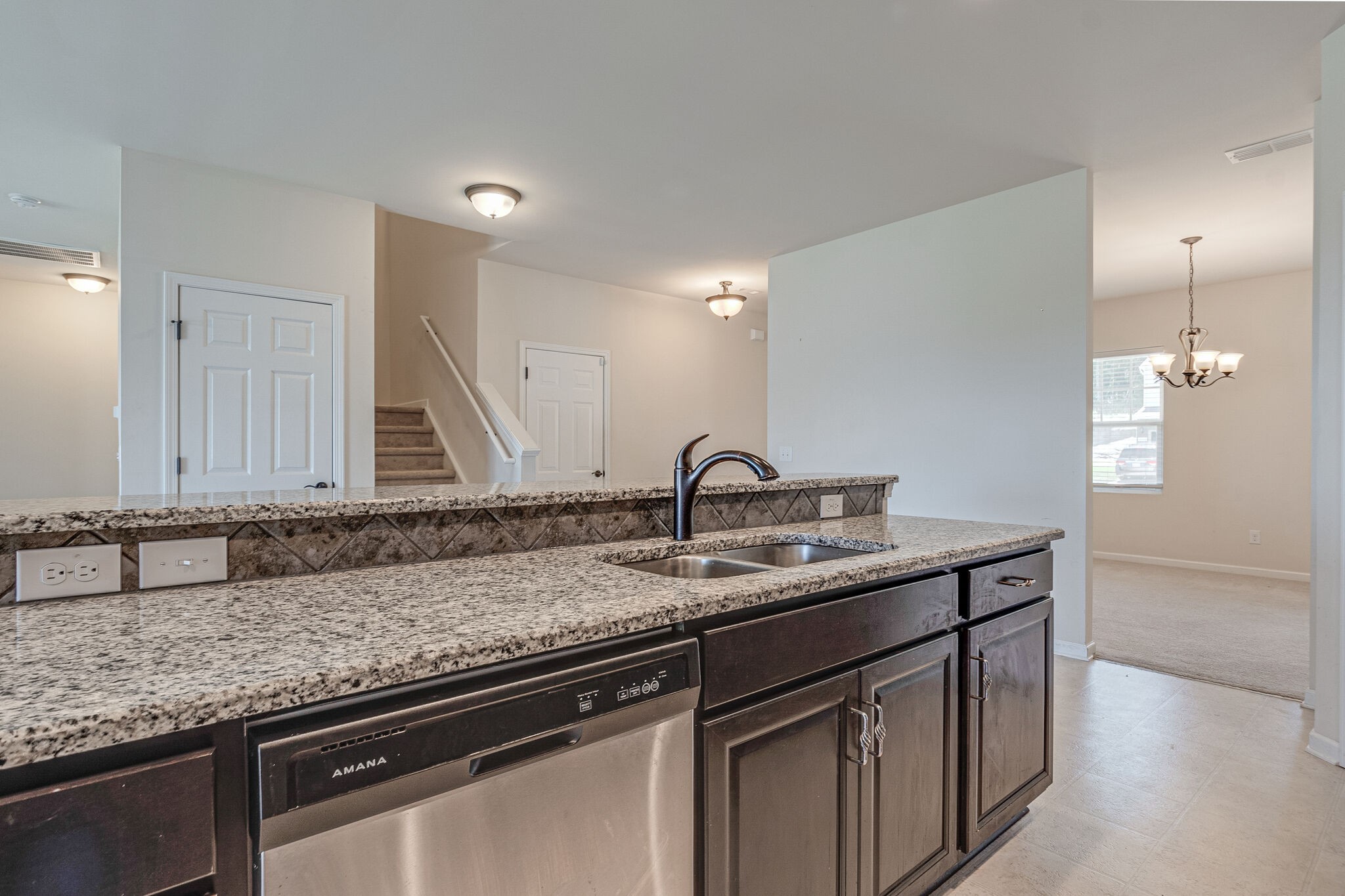 1439 Old Stone Road Lebanon, TN 37087 - Photo 10 of 39 a kitchen with stainless steel appliances granite countertop a sink and cabinets