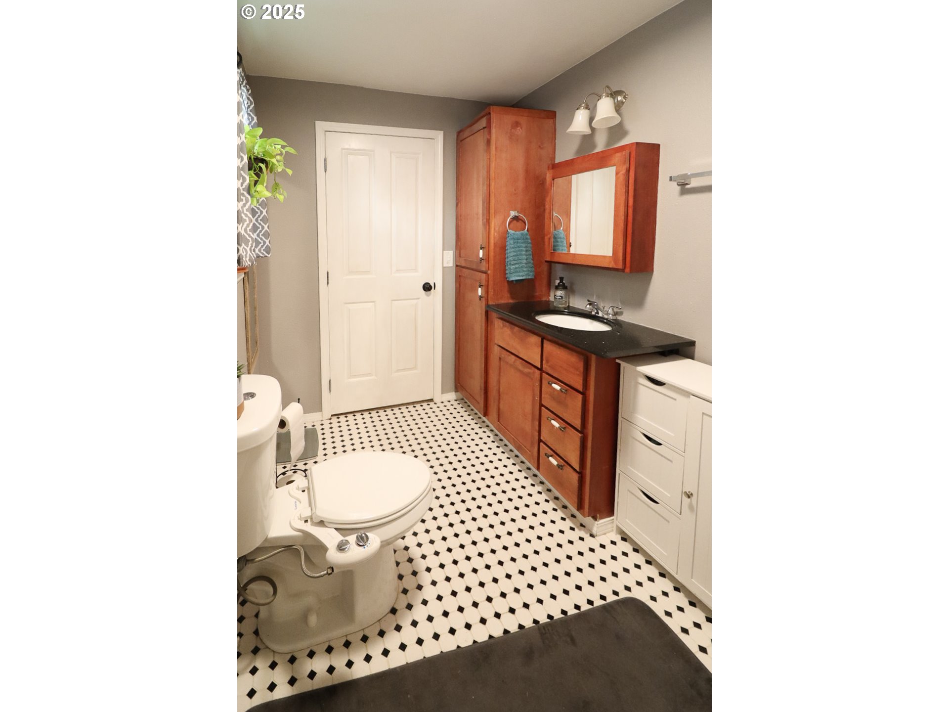 1960 Birch Street Elgin, OR 97827 - Photo 13 of 19 a bathroom with a sink toilet and shower
