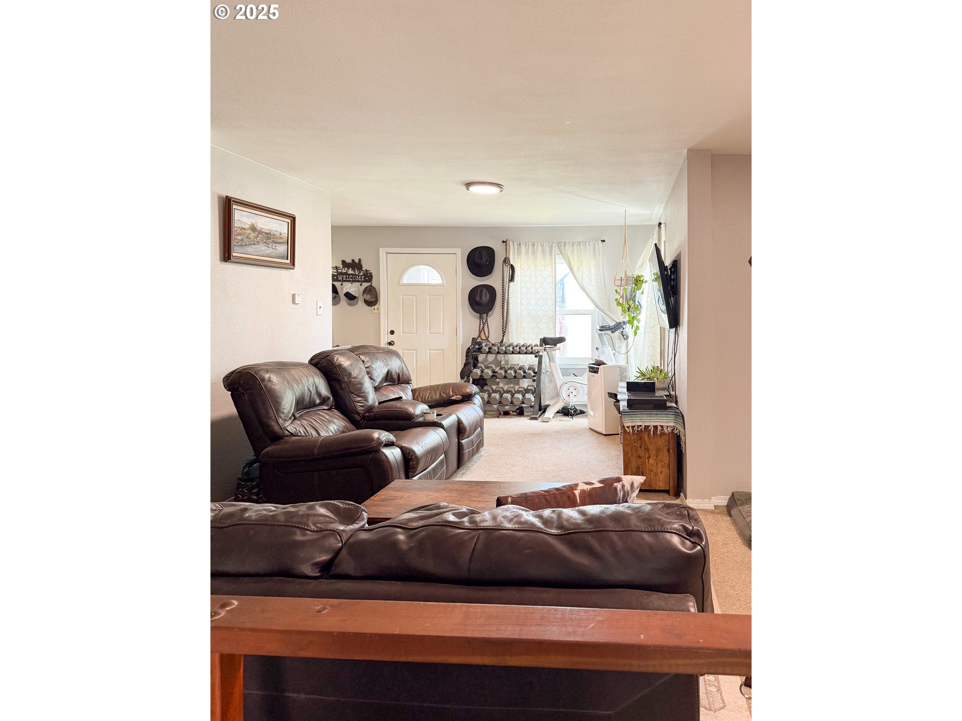1960 Birch Street Elgin, OR 97827 - Photo 3 of 19 a living room with furniture and a large window