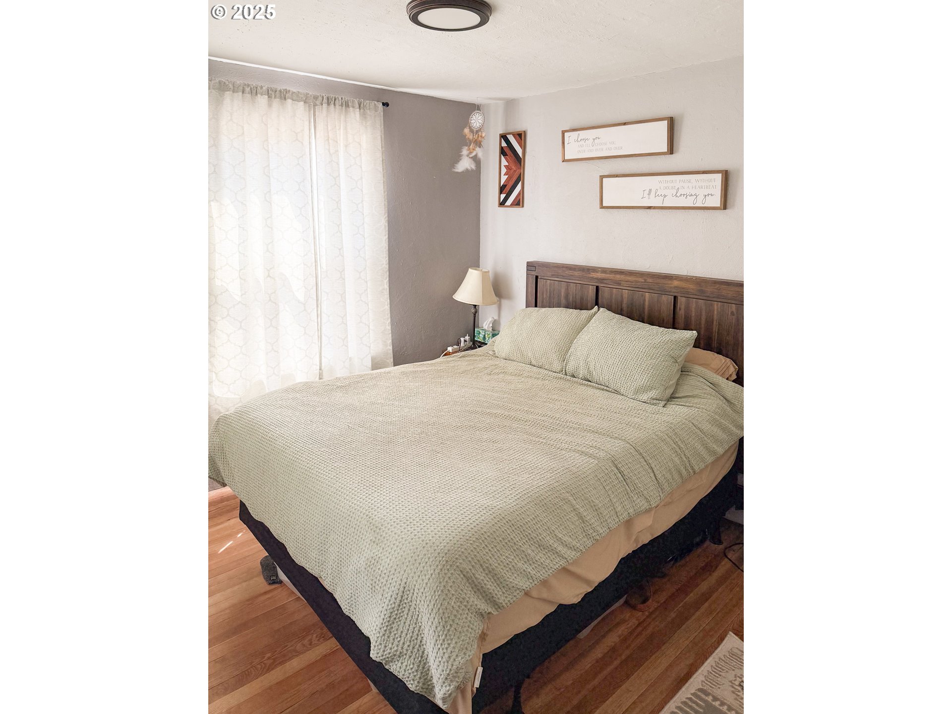 1960 Birch Street Elgin, OR 97827 - Photo 6 of 19 a bedroom with a bed and a window