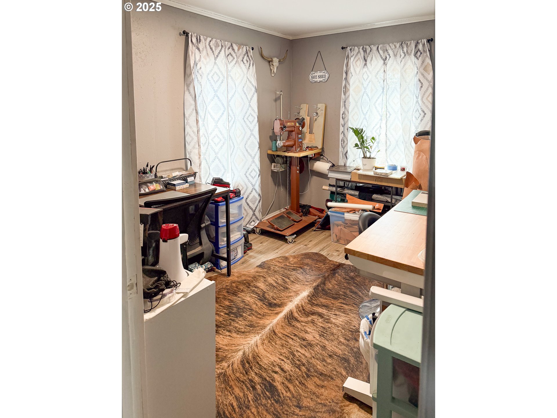 1960 Birch Street Elgin, OR 97827 - Photo 8 of 19 a view of a livingroom with workspace and a window