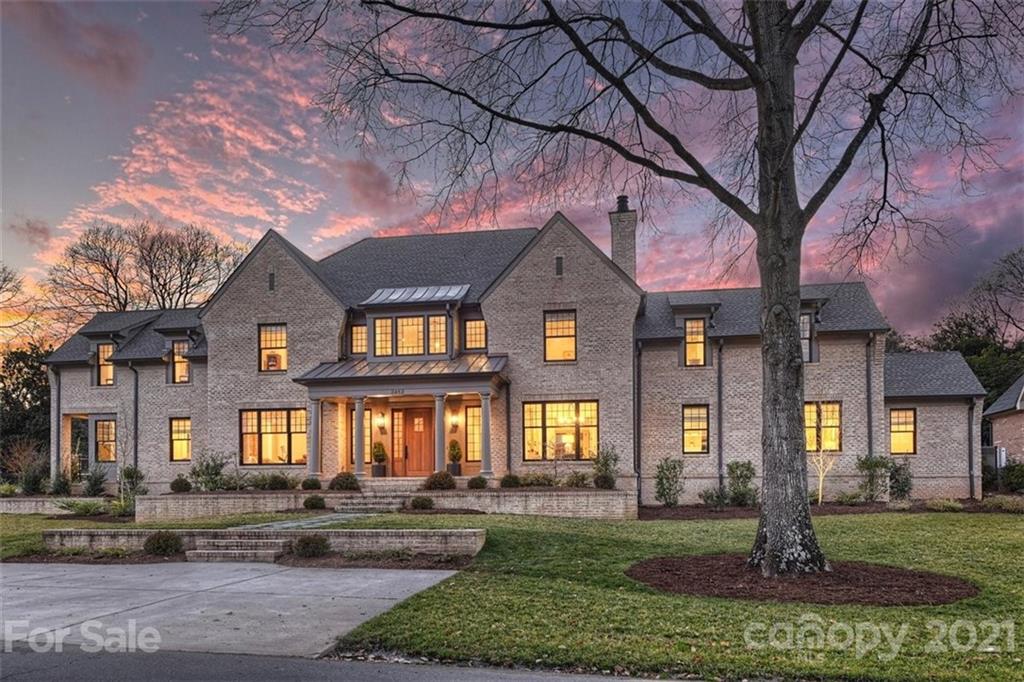 3452 Foxcroft Road Charlotte, NC 28211 - Photo 1 of 48 a front view of a house with a yard