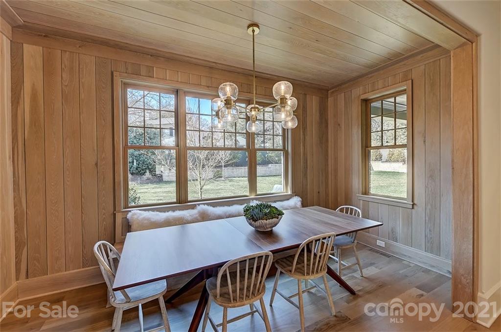 3452 Foxcroft Road Charlotte, NC 28211 - Photo 12 of 48 a view of a dining room with furniture window and outside view