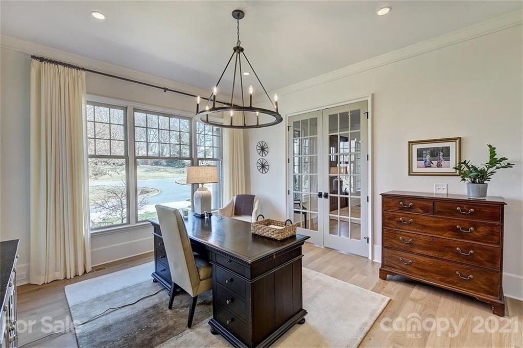 3452 Foxcroft Road Charlotte, NC 28211 - Photo 18 of 48 a living room with furniture and a window