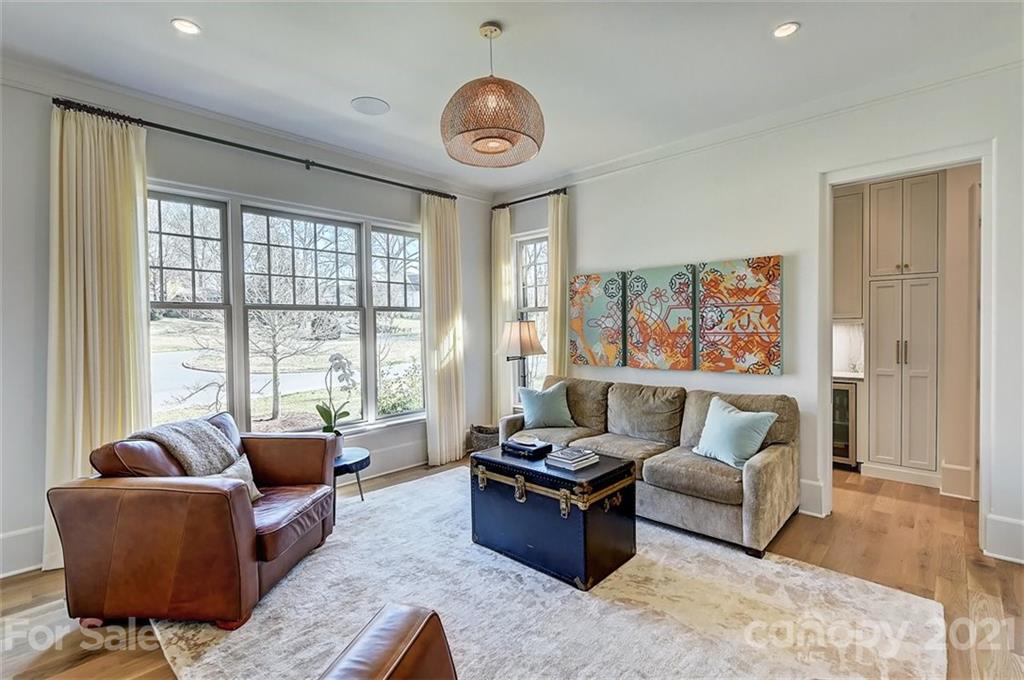 3452 Foxcroft Road Charlotte, NC 28211 - Photo 19 of 48 a living room with furniture and a large window