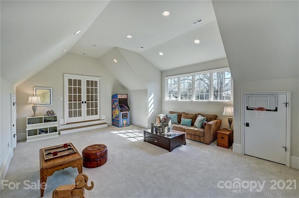 3452 Foxcroft Road Charlotte, NC 28211 - Photo 39 of 48 a living room with furniture and a window