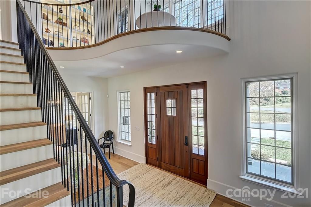 3452 Foxcroft Road Charlotte, NC 28211 - Photo 5 of 48 wooden floor with windows and entryway