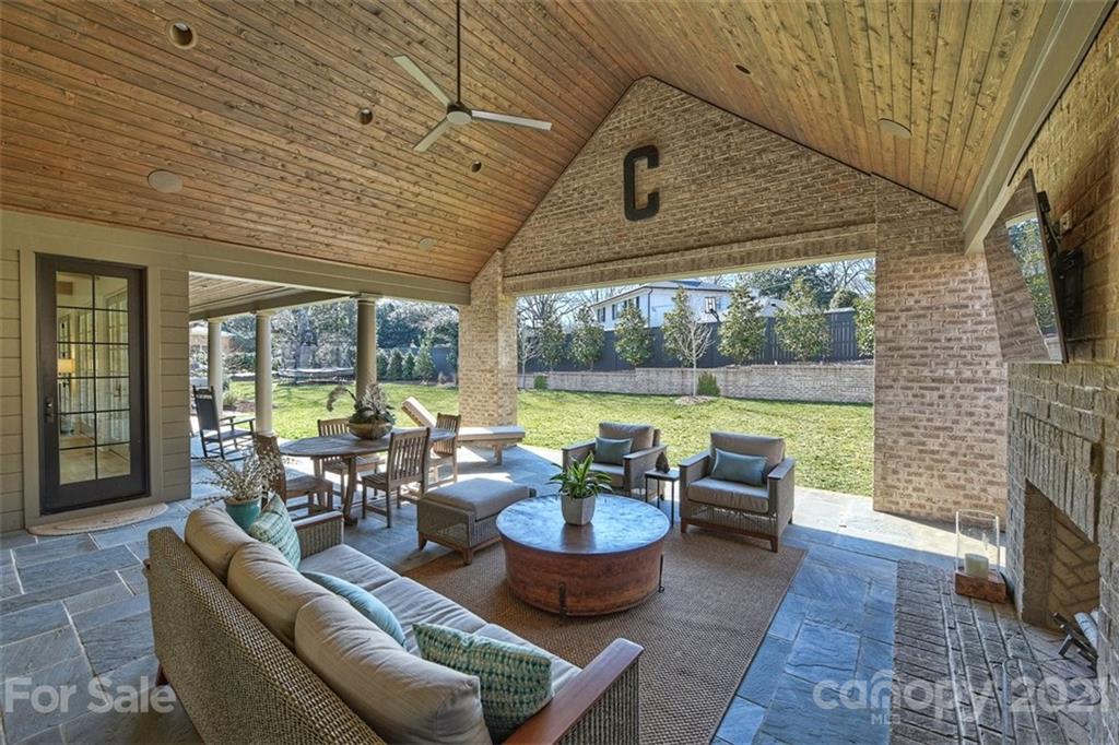 3452 Foxcroft Road Charlotte, NC 28211 - Photo 43 of 48 a living room with furniture and a floor to ceiling window