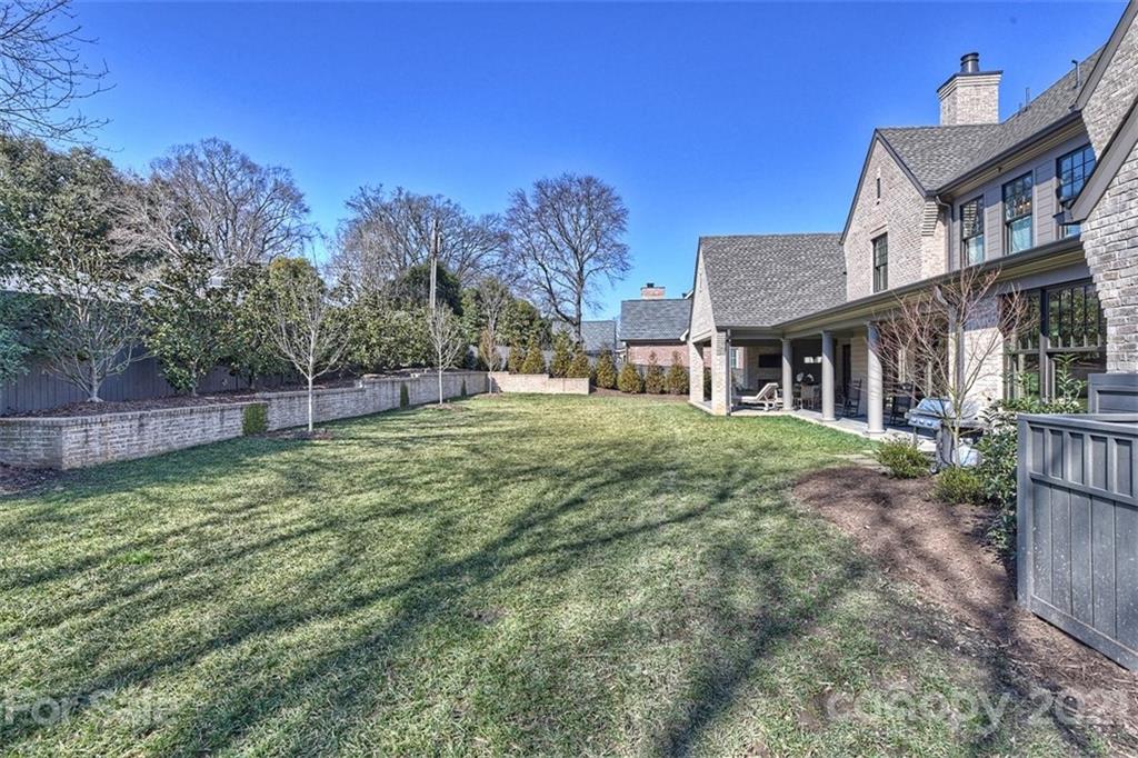 3452 Foxcroft Road Charlotte, NC 28211 - Photo 45 of 48 a view of a house with a yard