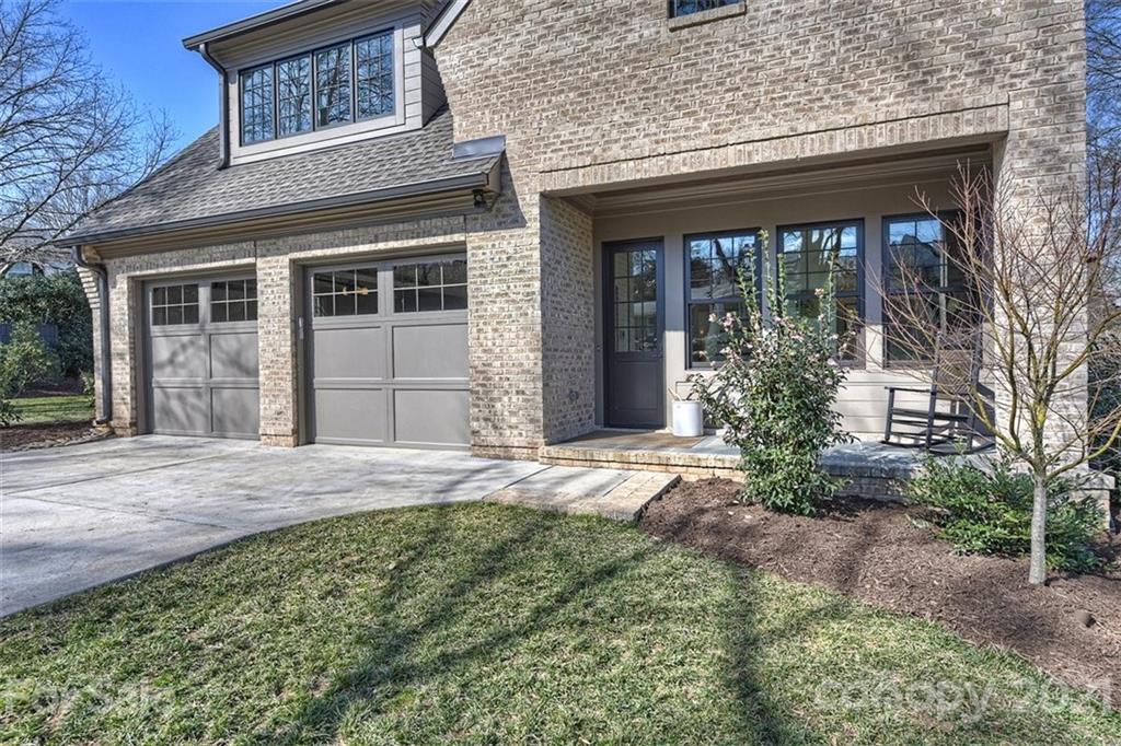 3452 Foxcroft Road Charlotte, NC 28211 - Photo 47 of 48 a front view of a house with garden
