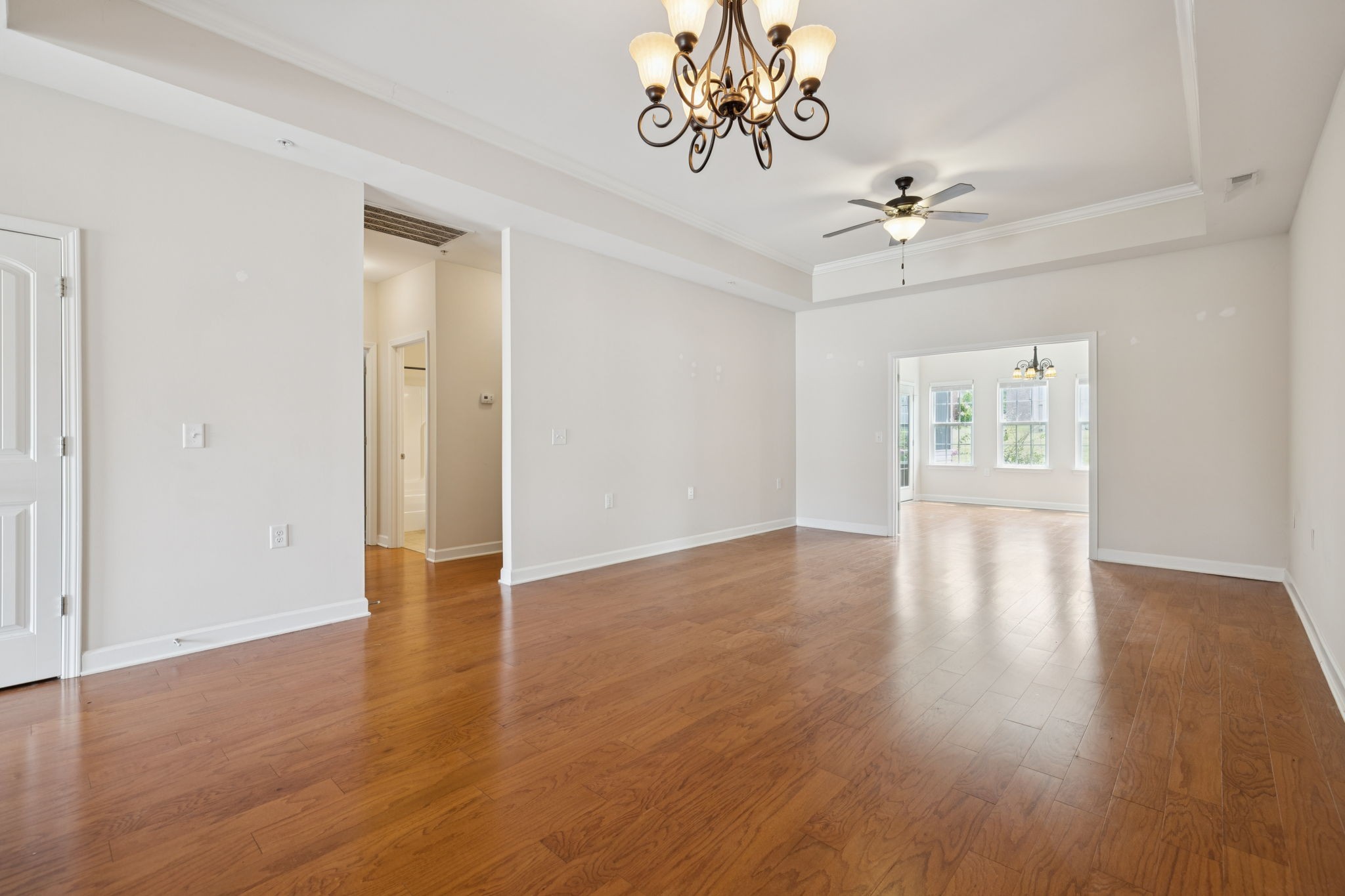 4600 Boxcroft Circle Mount Juliet, TN 37122 - Photo 11 of 30 a view of an empty room with a window and wooden floor