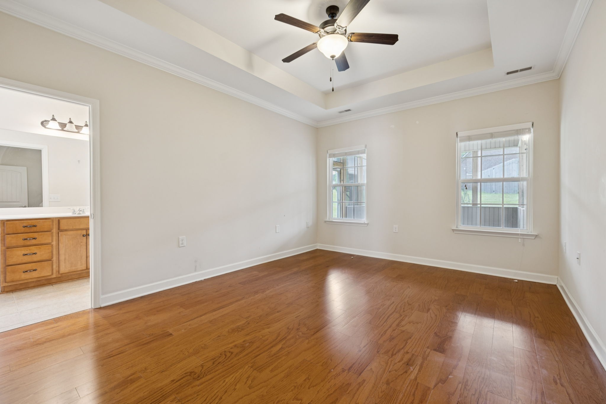 4600 Boxcroft Circle Mount Juliet, TN 37122 - Photo 16 of 30 a view of an empty room with wooden floor and a window