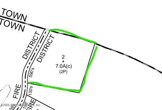 a sign on the wall of a street