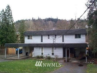 13925 Southeast Allen Road Bellevue, WA 98006 - Photo 1 of 1 a front view of a house with garden