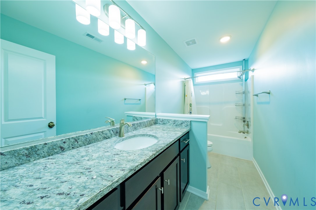 15607 Crowden Road Chesterfield, VA 23832 - Photo 34 of 57 Elongated vanity with a double sink, light-toned c