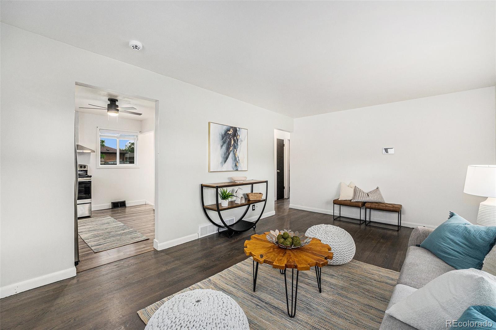 7625 Turner Drive Denver, CO 80221 - Photo 11 of 26 a living room with furniture and wooden floor