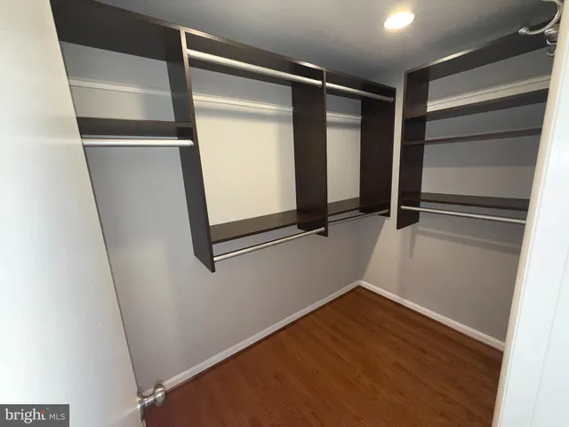a view of an empty walk in closet
