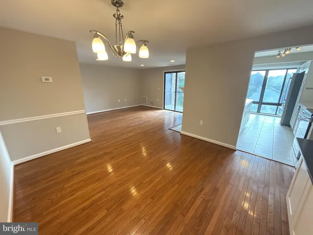 a view of livingroom with hardwood floor and window