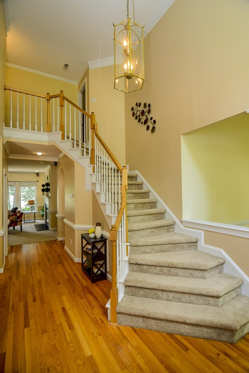 8808 Salute Street Raleigh, NC 27615 - Photo 2 of 25 The Grand Foyer is 2 stories tall and makes an elegant statement to all that visit. It will hold any size chandelier you may choose. Grand Foyer