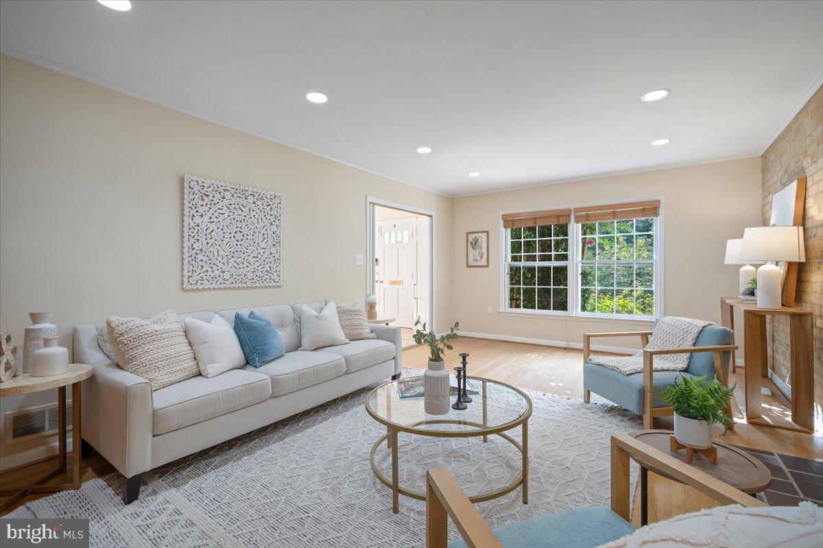 6305 Lenox Road Bethesda, MD 20817 - Photo 17 of 49 a living room with furniture and a large window