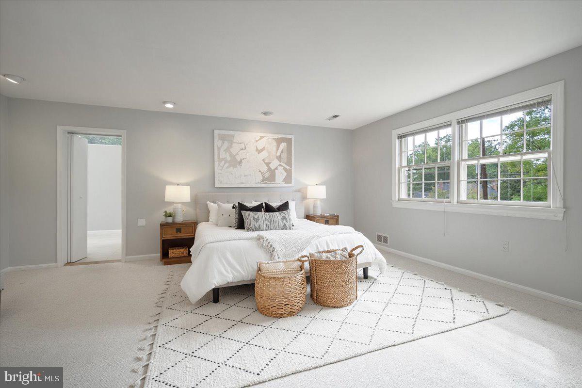 6305 Lenox Road Bethesda, MD 20817 - Photo 21 of 49 a bedroom with bed and a window