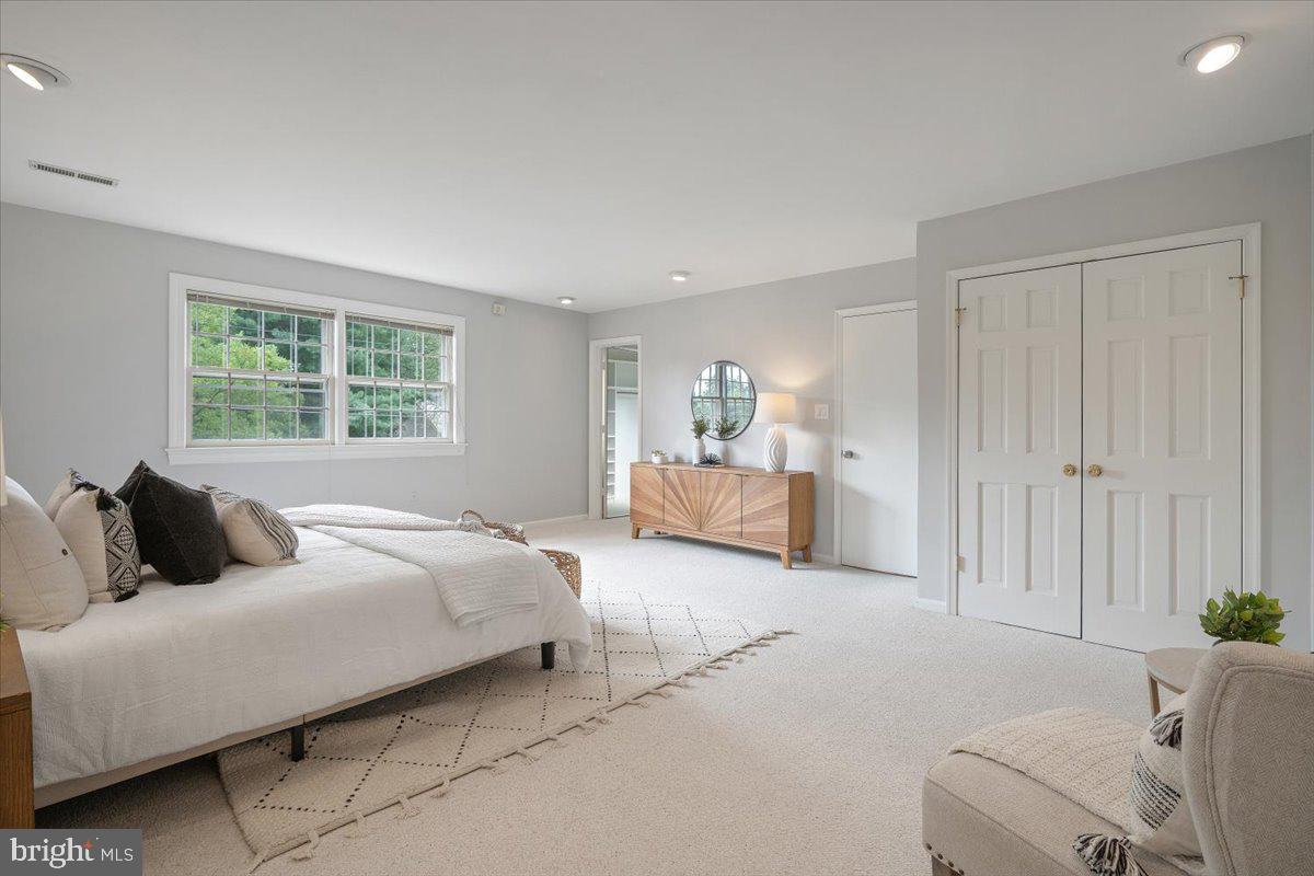 6305 Lenox Road Bethesda, MD 20817 - Photo 23 of 49 a bedroom with bed and window