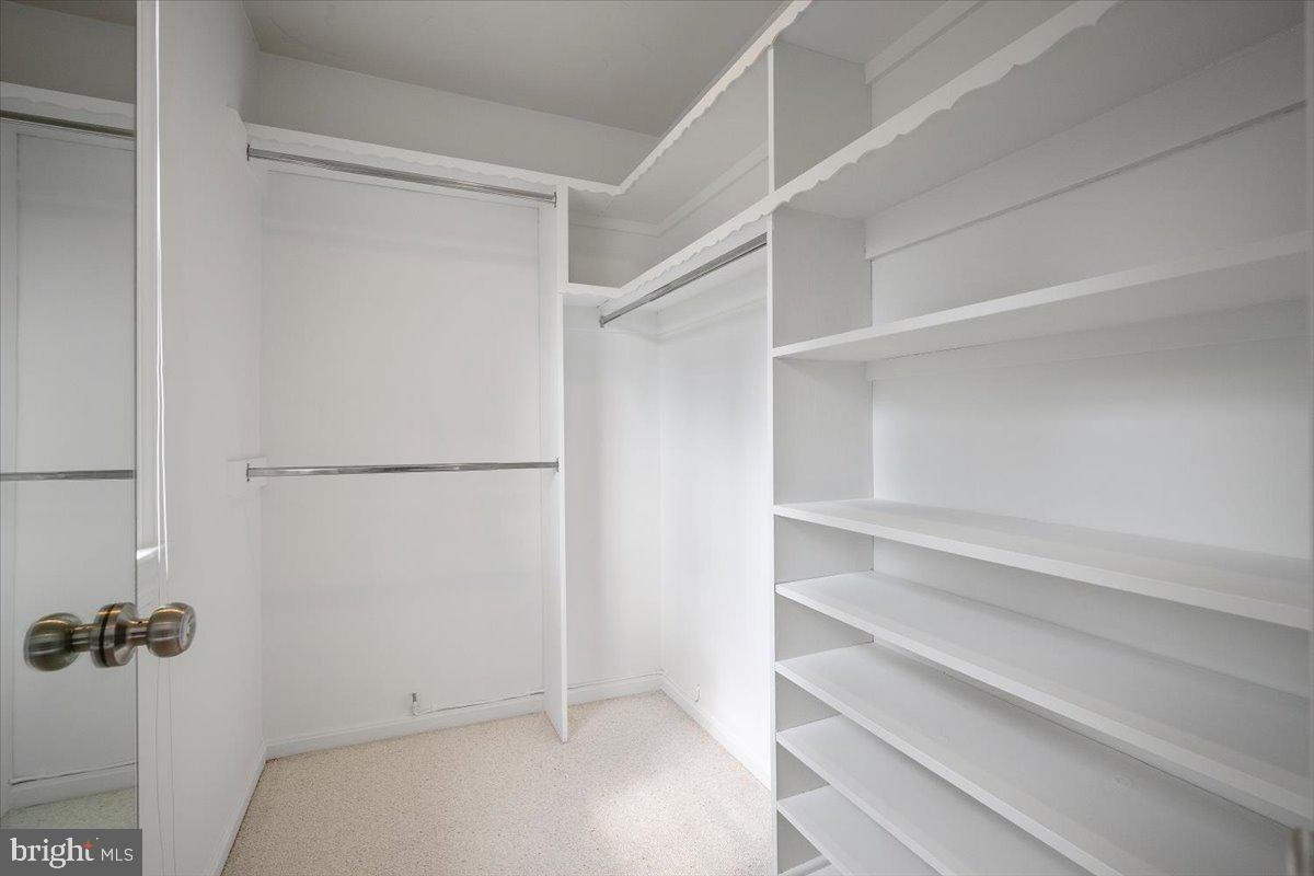 6305 Lenox Road Bethesda, MD 20817 - Photo 24 of 49 a view of an empty walk in closet