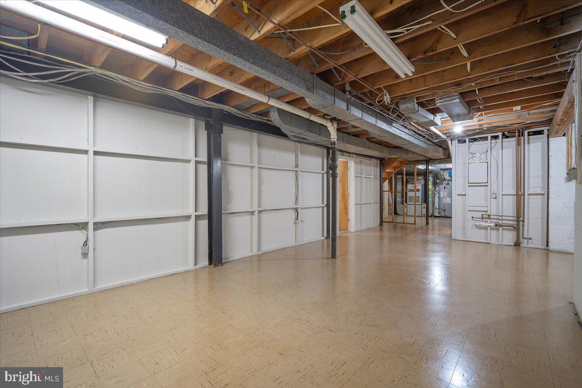 6305 Lenox Road Bethesda, MD 20817 - Photo 40 of 49 a view of an empty room with wooden floors