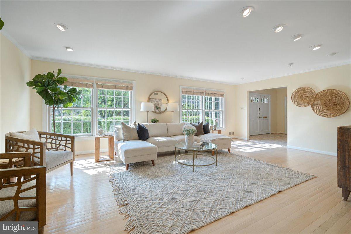 6305 Lenox Road Bethesda, MD 20817 - Photo 4 of 49 a living room with furniture and a large window