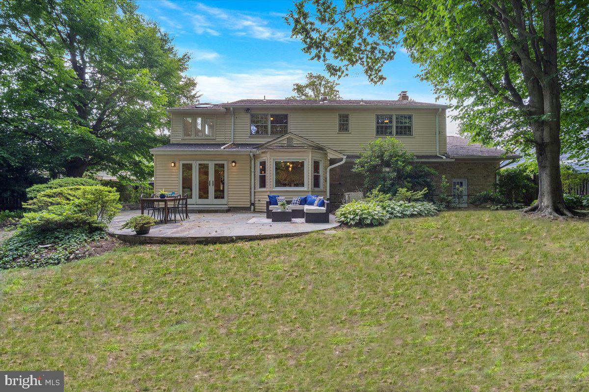 6305 Lenox Road Bethesda, MD 20817 - Photo 43 of 49 a front view of a house with garden