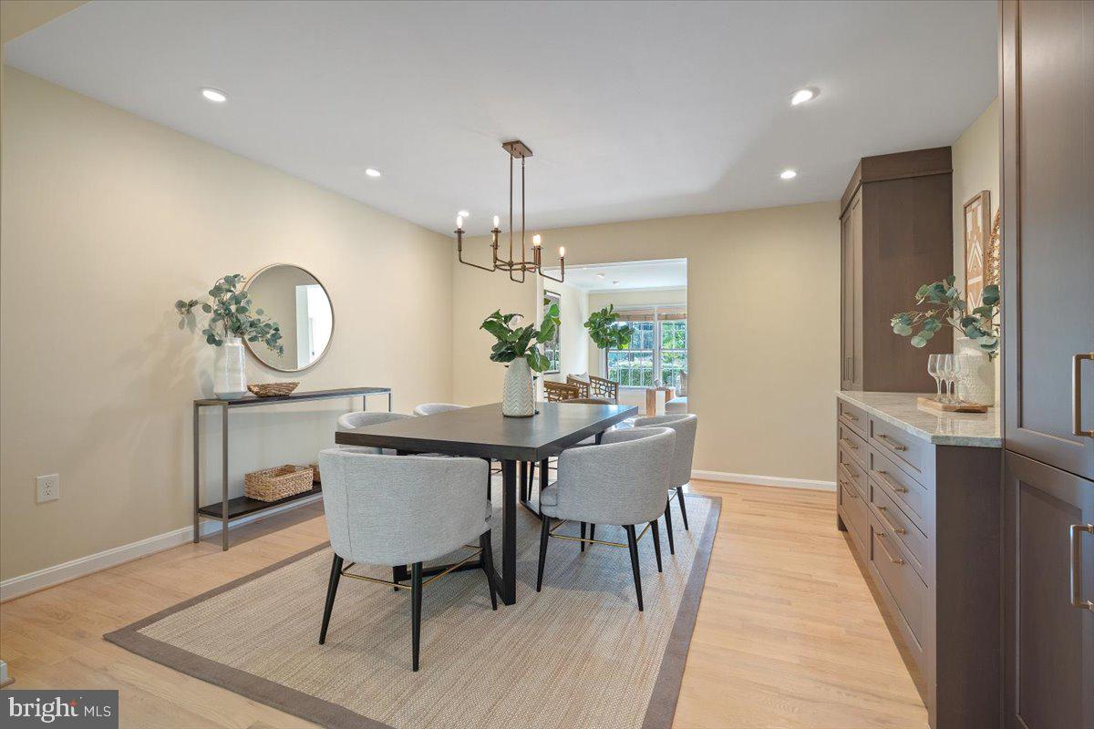 6305 Lenox Road Bethesda, MD 20817 - Photo 9 of 49 a view of a dining room with furniture window and wooden floor