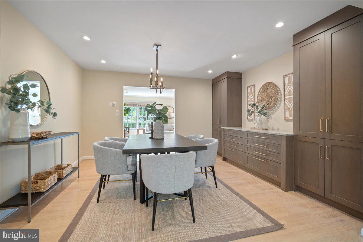 6305 Lenox Road Bethesda, MD 20817 - Photo 10 of 49 a dining room with furniture and window