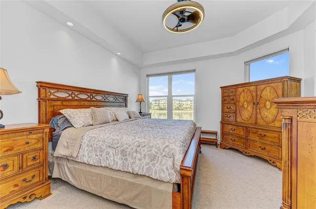 a view of walk in closet with clothes