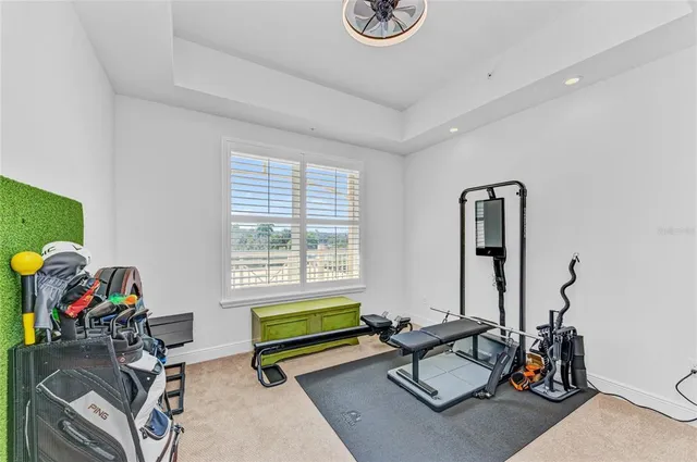 a view of a two chairs in the balcony