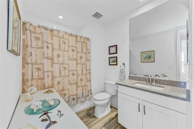 a view of a lake with a city