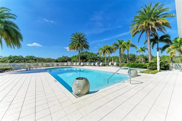 a view of a park with sitting area