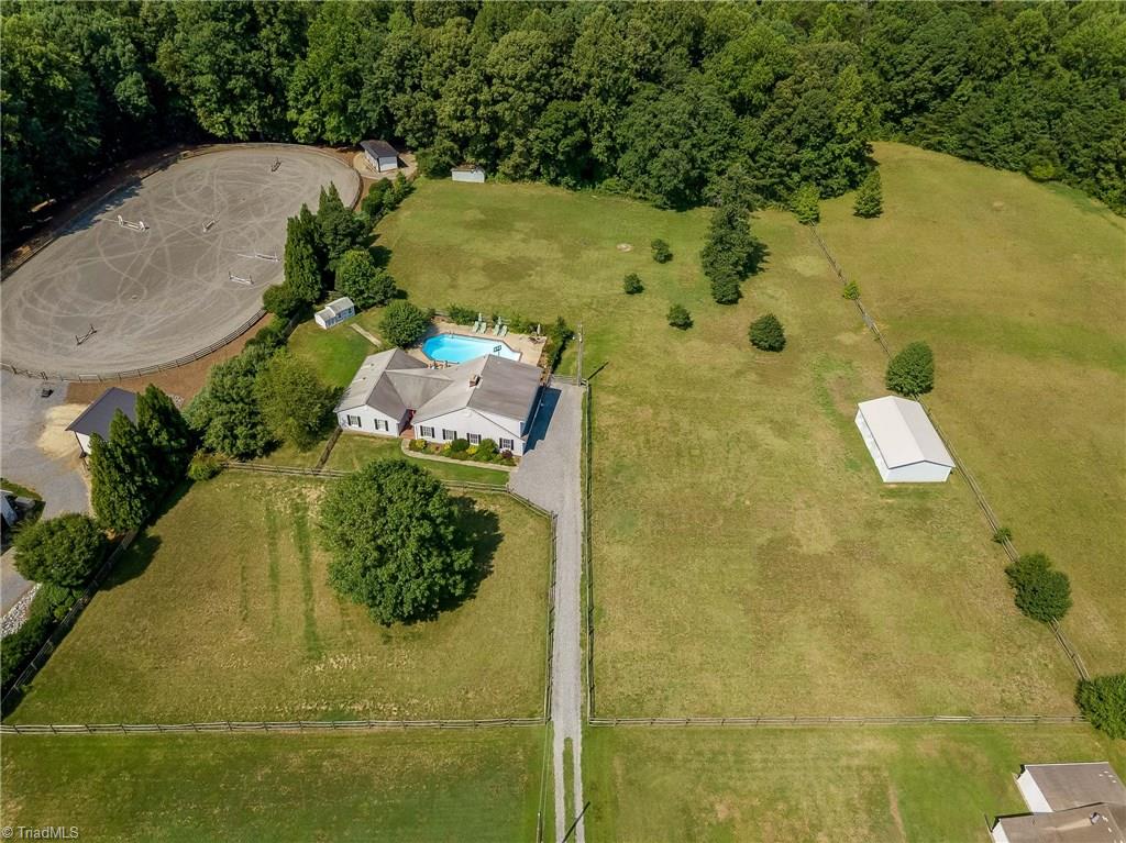 7607 Strawberry Road Summerfield, NC 27358 - Photo 1 of 30 3 + Acres offers much Room to Roam, have a garden, horses or a mini farm.