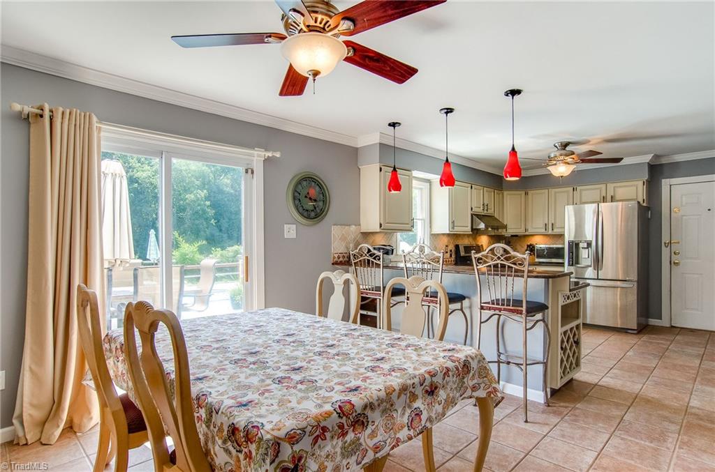 7607 Strawberry Road Summerfield, NC 27358 - Photo 16 of 30 Wonderful area to entertain in and out of doors!