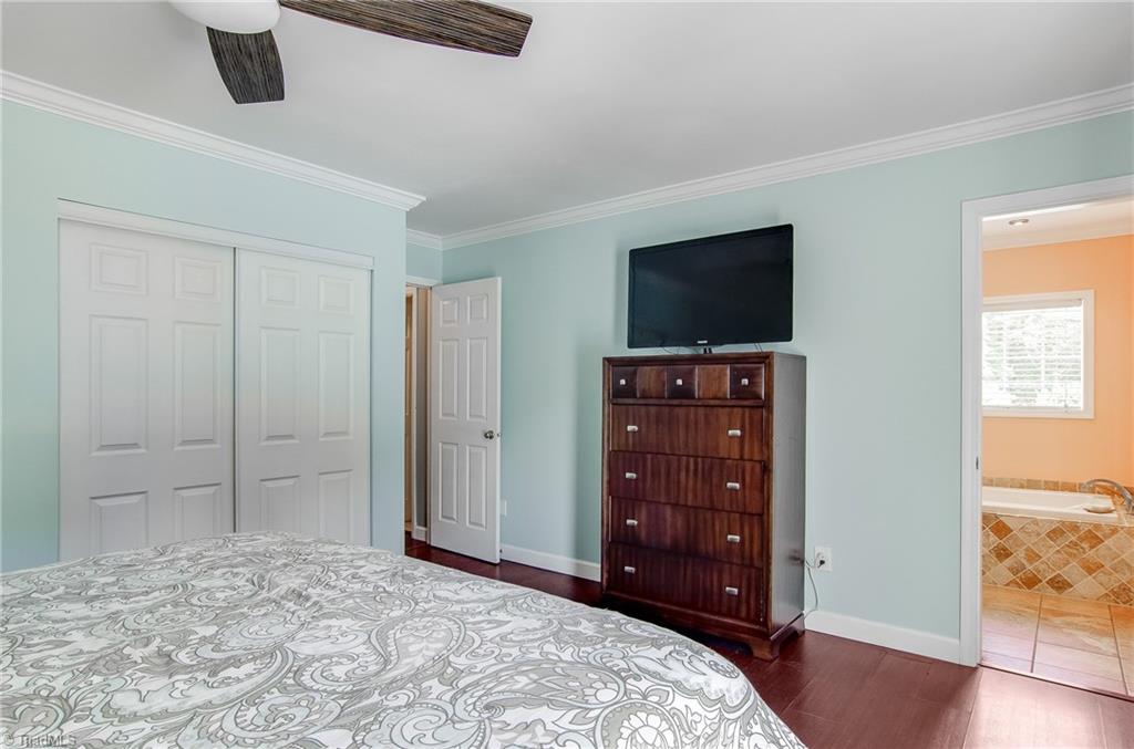 7607 Strawberry Road Summerfield, NC 27358 - Photo 18 of 30 The door enters to a spa like bath room!