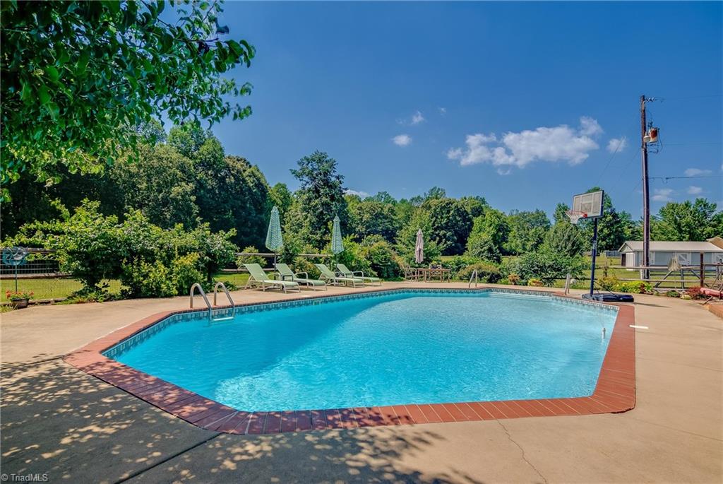 7607 Strawberry Road Summerfield, NC 27358 - Photo 8 of 30 Enjoy a natural private setting in your own back yard!